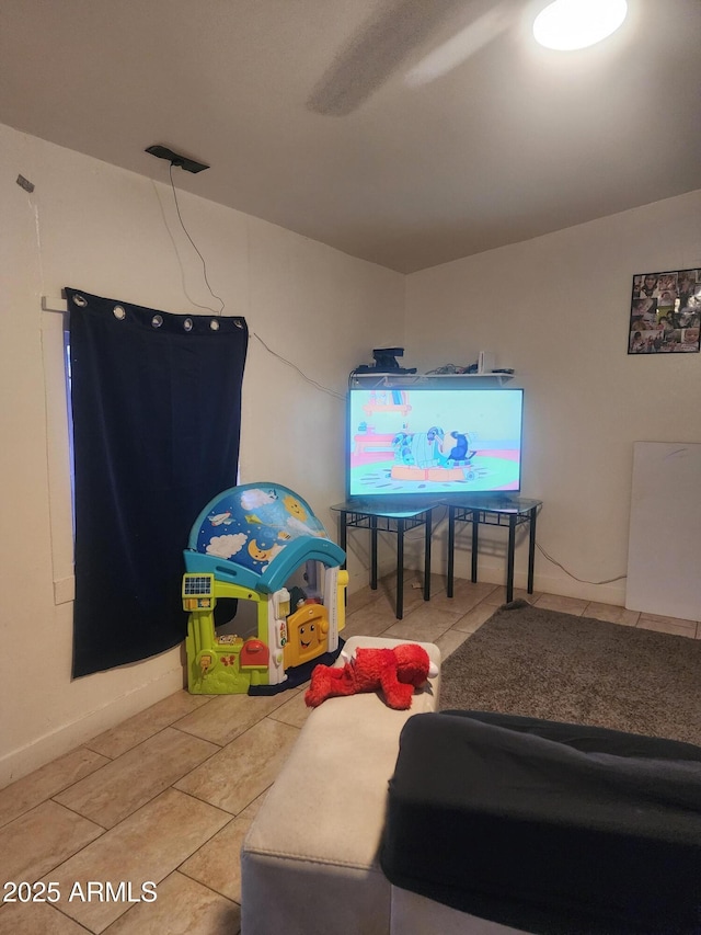 game room with tile patterned floors