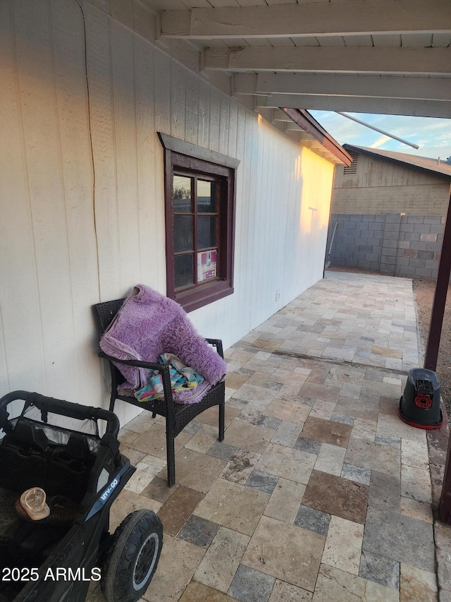 view of patio with fence