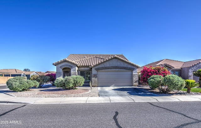 3790 W White Canyon Rd, San Tan Valley, AZ 85144 - view of front of house with stucco siding, a garage, concrete driveway, and a tiled roof