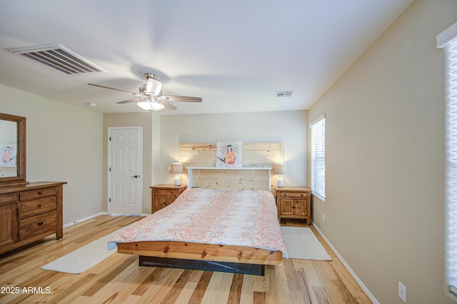 3790 W White Canyon Rd, San Tan Valley, AZ 85144 - bedroom featuring light wood-style flooring, baseboards, and ceiling fan