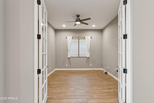 11609 W Andrew Ln, Peoria, AZ 85383 - spare room with french doors, recessed lighting, ceiling fan, light wood finished floors, and baseboards