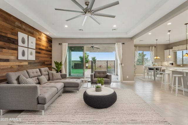 11609 W Andrew Ln, Peoria, AZ 85383 - living room with recessed lighting, wood walls, and ceiling fan