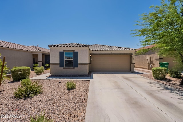 7238 N 126th Ln, Glendale, AZ 85307 - mediterranean / spanish-style home with an attached garage, stucco siding, driveway, and a tile roof
