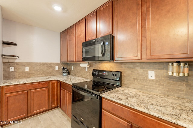 7238 N 126th Ln, Glendale, AZ 85307 - kitchen with black appliances, tasteful backsplash, light stone countertops, and brown cabinetry