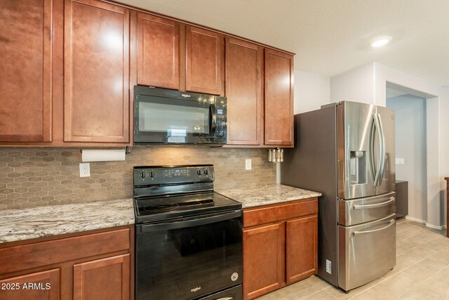 7238 N 126th Ln, Glendale, AZ 85307 - kitchen featuring black appliances, backsplash, light tile patterned flooring, and light stone counters