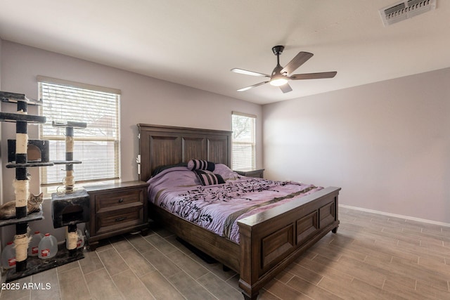 7238 N 126th Ln, Glendale, AZ 85307 - bedroom featuring wood finished floors and a ceiling fan