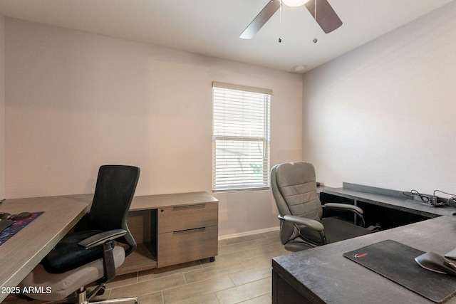 7238 N 126th Ln, Glendale, AZ 85307 - home office featuring a ceiling fan and baseboards