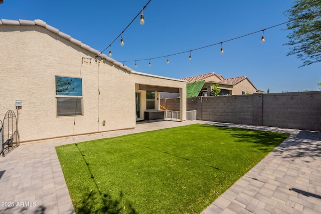 7238 N 126th Ln, Glendale, AZ 85307 - fenced backyard with a patio