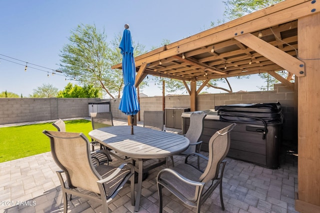 7238 N 126th Ln, Glendale, AZ 85307 - fenced backyard featuring a hot tub, a patio, and outdoor dining area