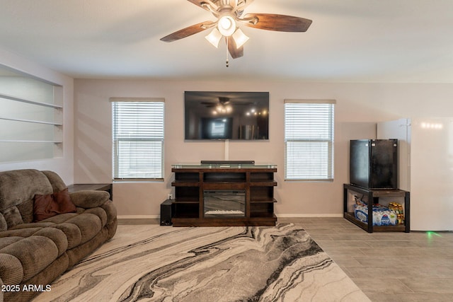 7238 N 126th Ln, Glendale, AZ 85307 - living room with a ceiling fan and built in features