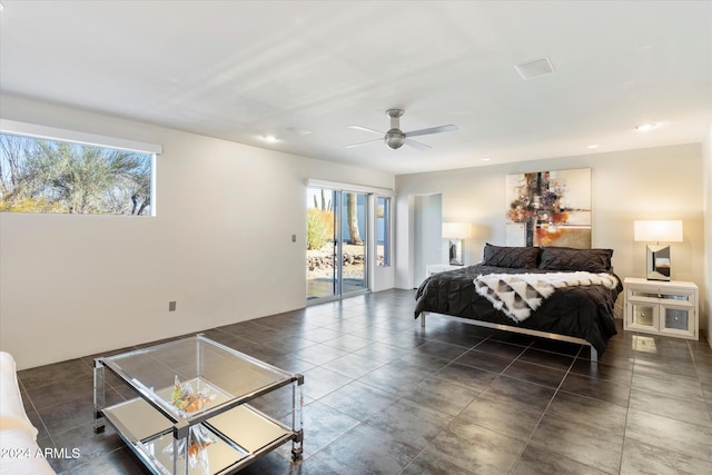 bedroom with ceiling fan, access to exterior, and multiple windows