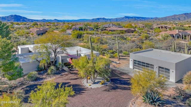 birds eye view of property featuring a mountain view