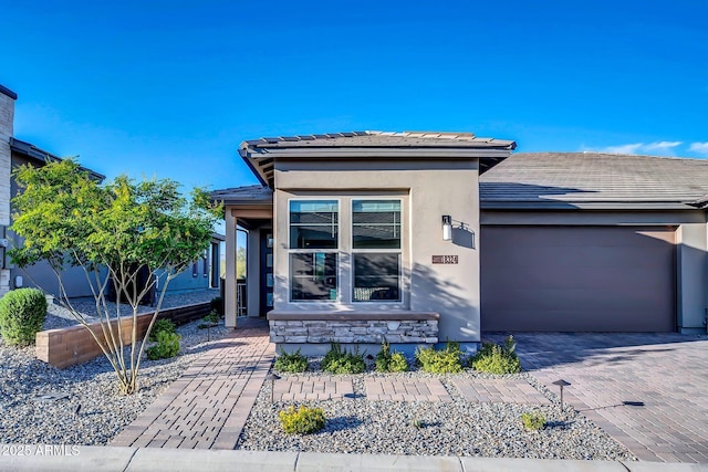 prairie-style home with a garage