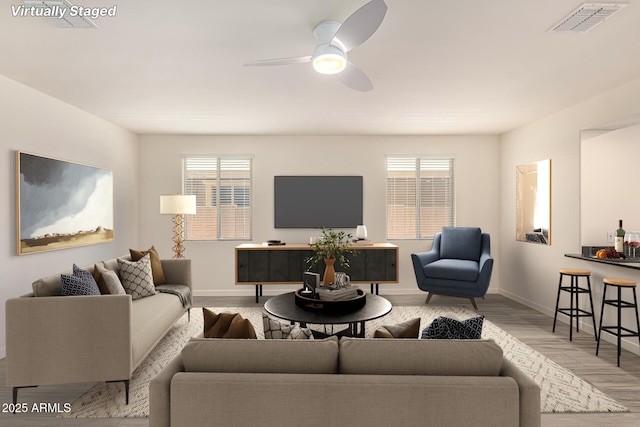4116 E Roy Rogers Rd, Cave Creek, AZ 85331 - living room featuring light wood finished floors, plenty of natural light, baseboards, and a ceiling fan