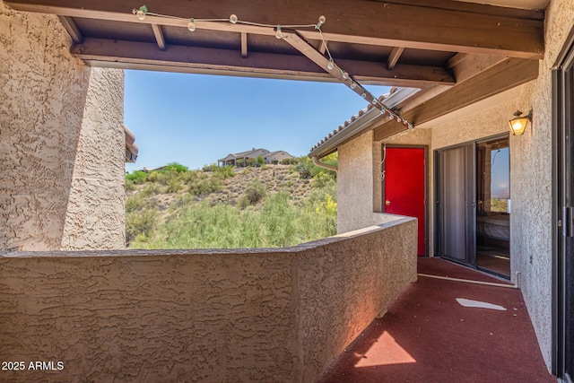 view of patio / terrace featuring a balcony