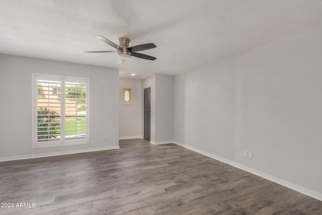 empty room featuring ceiling fan and hardwood / wood-style flooring