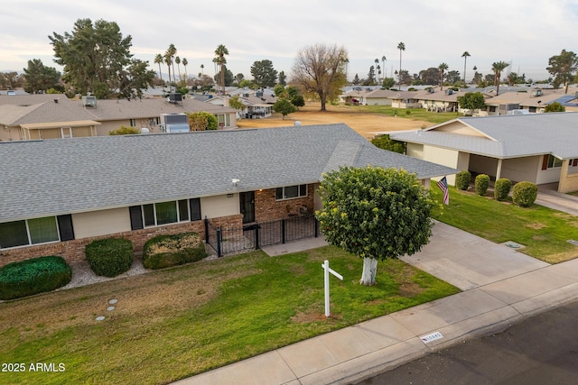 view of front of home featuring a front lawn