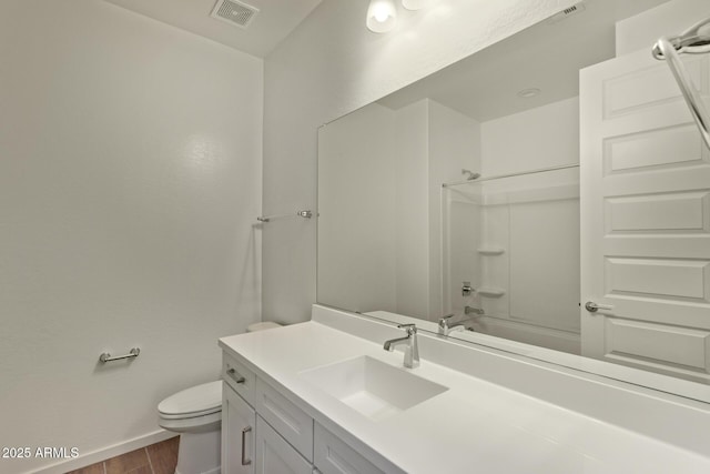 bathroom with baseboards, visible vents, toilet, wood finished floors, and bathtub / shower combination