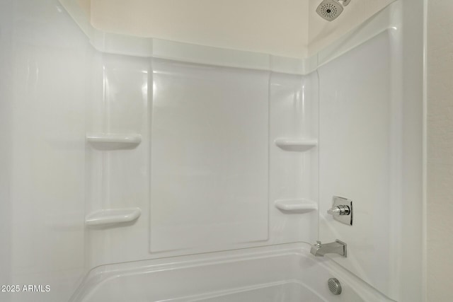 full bath featuring shower / tub combination