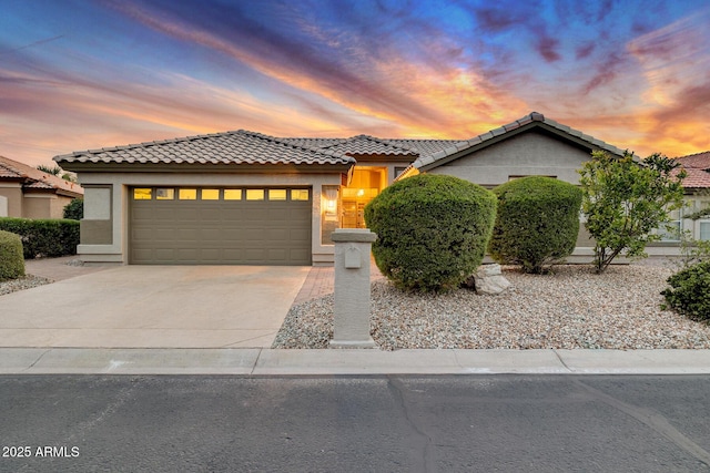 view of front of property with a garage