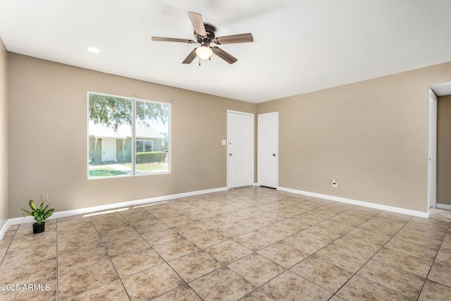 2645 W Elm St, Phoenix, AZ 85017 - tiled spare room with ceiling fan and baseboards
