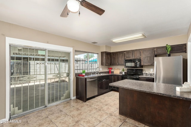 2645 W Elm St, Phoenix, AZ 85017 - kitchen featuring black appliances, a sink, dark brown cabinets, ceiling fan, and light tile patterned floors