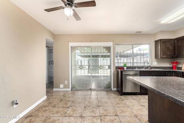2645 W Elm St, Phoenix, AZ 85017 - kitchen featuring dishwasher, dark countertops, dark brown cabinets, and a ceiling fan