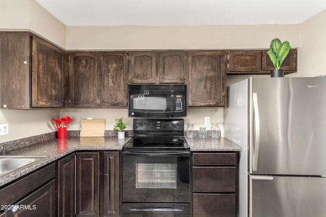 2645 W Elm St, Phoenix, AZ 85017 - kitchen with black appliances, dark brown cabinets, and dark countertops