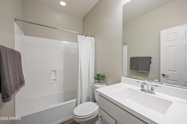 full bathroom featuring shower / bath combination with curtain, vanity, and toilet