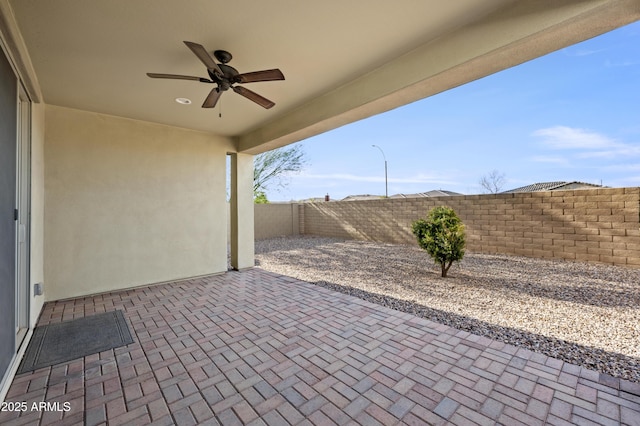 view of patio with ceiling fan