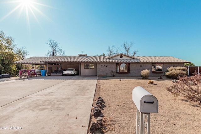 ranch-style house with a carport