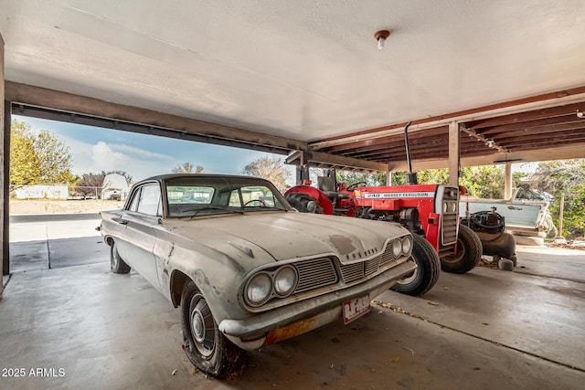 garage with a carport