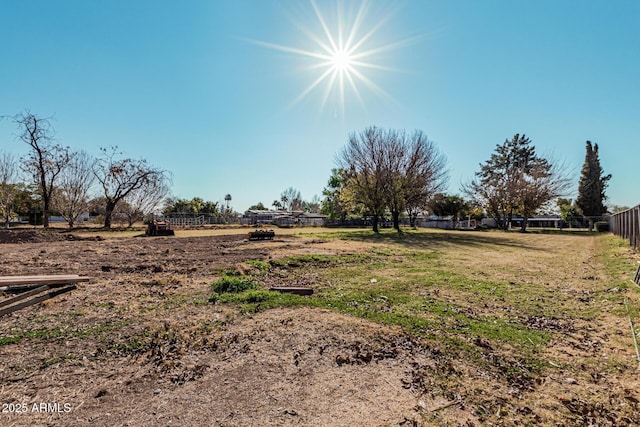 view of yard with a rural view