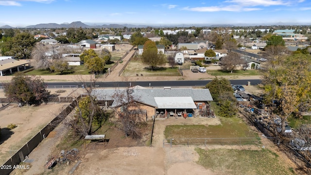 birds eye view of property featuring a mountain view