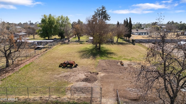 view of yard with a rural view