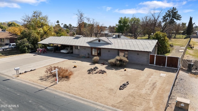 ranch-style home with a carport