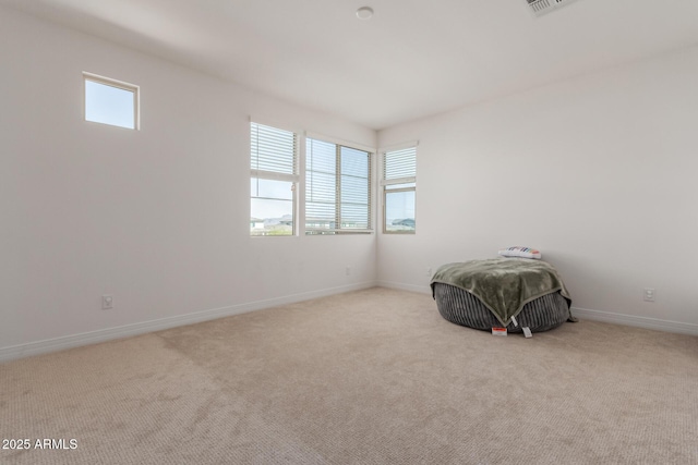 bedroom featuring carpet and baseboards