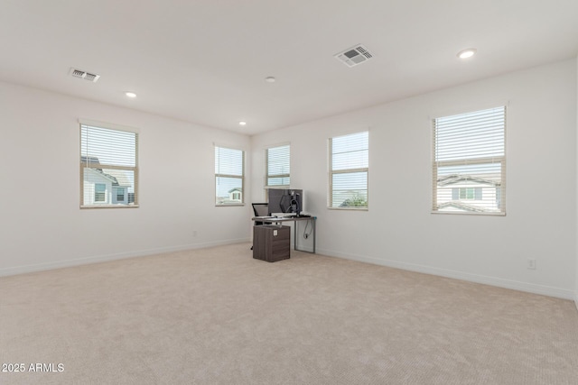 office with recessed lighting, light colored carpet, and visible vents