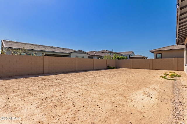 view of yard featuring a fenced backyard