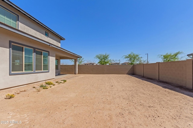 view of yard featuring a fenced backyard