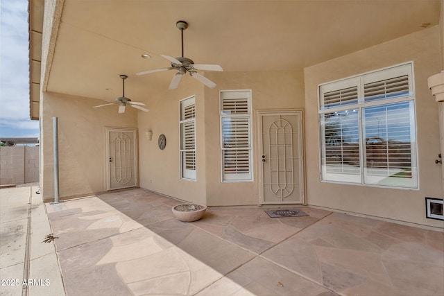 10809 W Harmony Ln, Peoria, AZ 85373 - exterior space with stucco siding, fence, a patio area, and ceiling fan