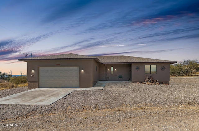 view of front of property featuring a garage