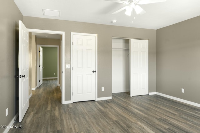 unfurnished bedroom with dark hardwood / wood-style flooring and ceiling fan