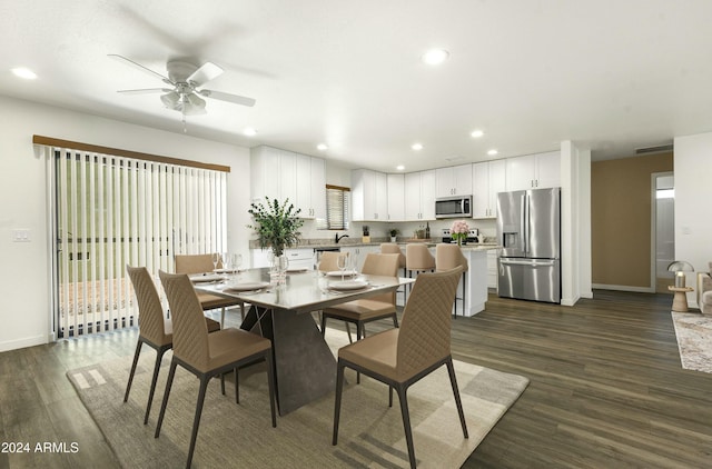 dining room featuring dark hardwood / wood-style floors and ceiling fan