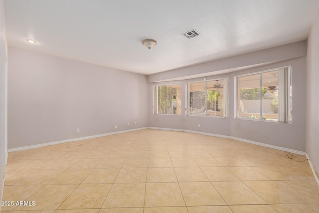 728 W Sandra Ter, Phoenix, AZ 85023 - empty room featuring plenty of natural light, light tile patterned floors, and recessed lighting