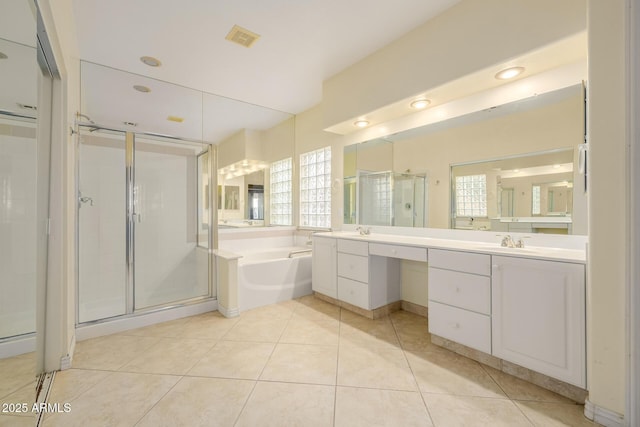 728 W Sandra Ter, Phoenix, AZ 85023 - bathroom with a garden tub, a shower stall, vanity, and tile patterned flooring
