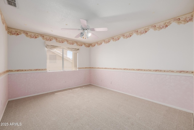 728 W Sandra Ter, Phoenix, AZ 85023 - spare room with carpet and a ceiling fan