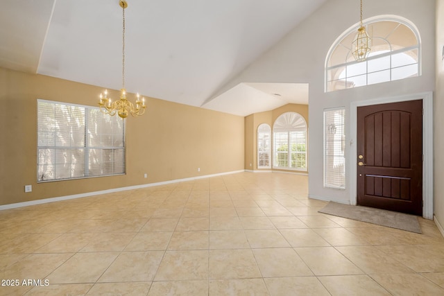 728 W Sandra Ter, Phoenix, AZ 85023 - entrance foyer featuring a chandelier, vaulted ceiling, and light tile patterned floors