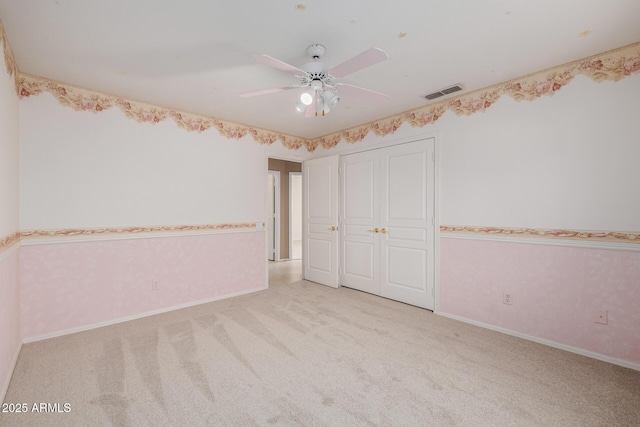 728 W Sandra Ter, Phoenix, AZ 85023 - unfurnished bedroom with carpet flooring, a closet, and ceiling fan