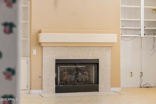 728 W Sandra Ter, Phoenix, AZ 85023 - detailed view of a tile fireplace and baseboards